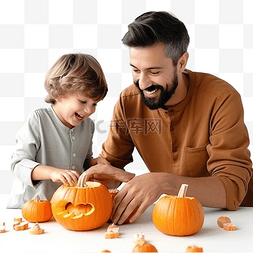 开心的小男生图片_父亲和她的儿子雕刻南瓜，为万圣