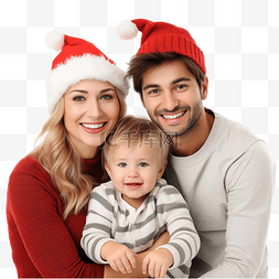 年轻的父母和儿子在家庆祝圣诞节