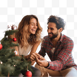 快乐的年轻夫妇喜欢在家装饰圣诞