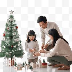 亚洲三口之家一起装饰圣诞树，在