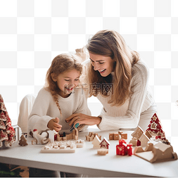 在家玩耍的孩子图片_母亲和女儿在家里的圣诞厨房里玩