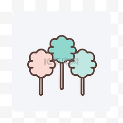 三根带有树图案的柔和彩色糖果 