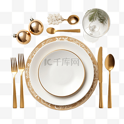 聚会礼品图片_圣诞餐桌布置，配有金色餐具和装