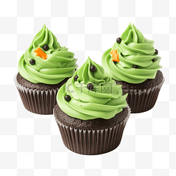 绿色的纸杯蛋糕图片_作为万圣节款待准备的带有绿色糖