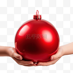 抱球孩子图片_圣诞节日落时拿着红色圣诞球的孩
