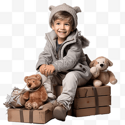 带着圣诞礼物盒的小男孩坐在木制
