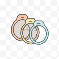 彩色背景中的三个彩色结婚戒指 