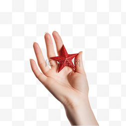亮闪闪的星星图片_拿着圣诞星的红指甲的女性白种人