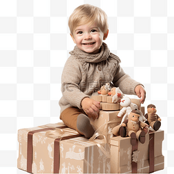 下雪开心的孩子图片_带着圣诞礼物盒的小男孩坐在木制
