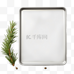 烤箱烤盘图片_带圣诞树枝的空烤盘顶视图
