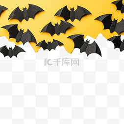 文本复制图片_万圣节装饰概念黑纸蝙蝠黄色纸板
