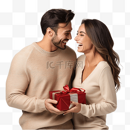 幸福的夫妇看着他们手中的圣诞礼