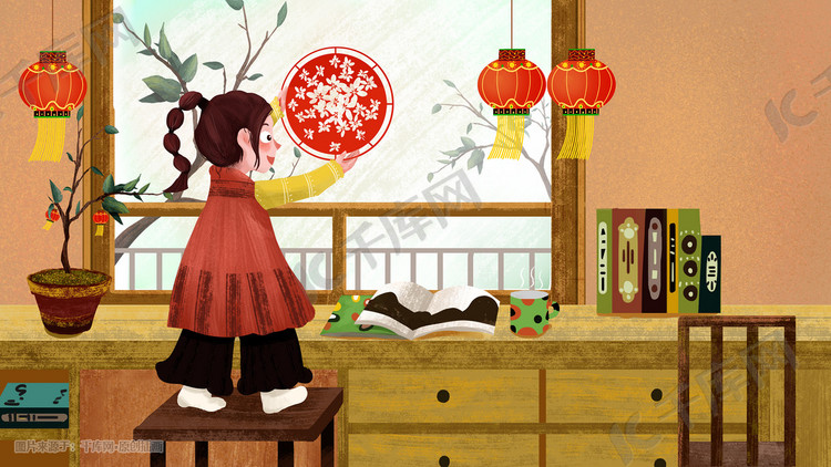 冬日小年节日贴窗花的可爱女孩