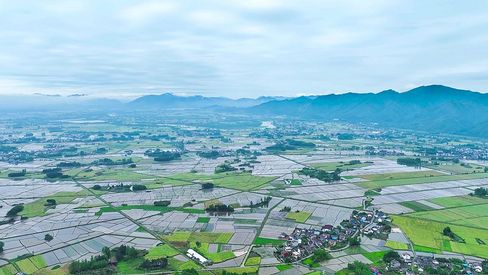 航拍雨天后的梯田山村农田农业农村