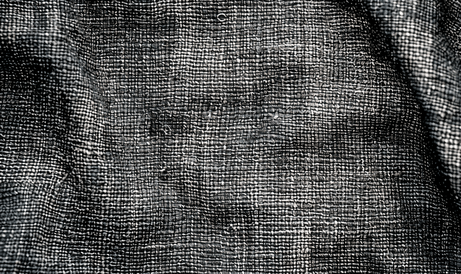 作为自然背景的浓密灰色织物的纹理