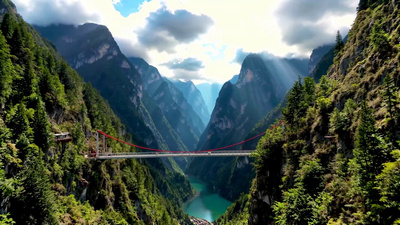 丽江东巴谷网红吊桥峡谷高山航拍