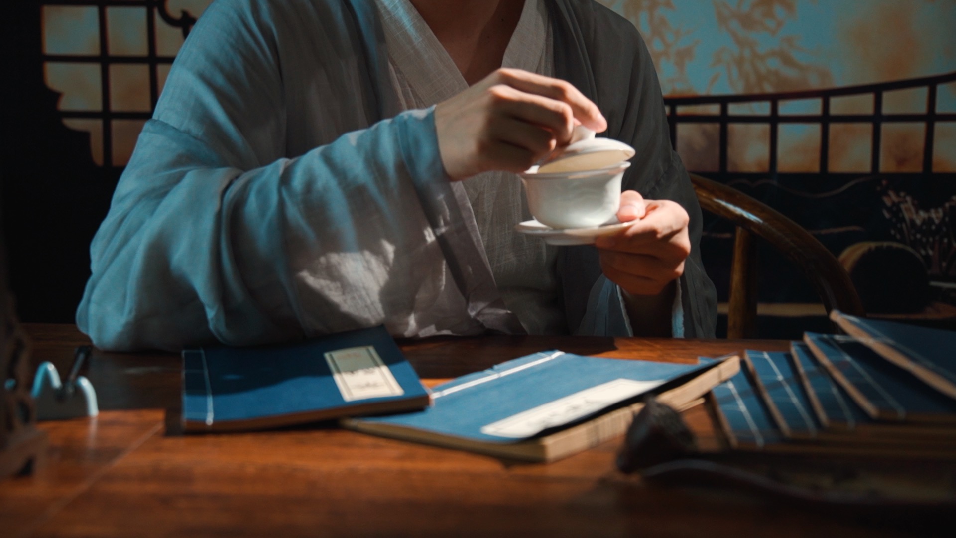 古风喝茶品茶古书场景视频1080视频特效素材-千库网