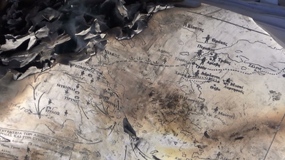 地图实拍视频素材烧毁旧地图
